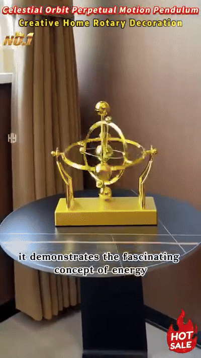 gold celestial orbit perpetual motion sculpture cosmic kinetic desk decor