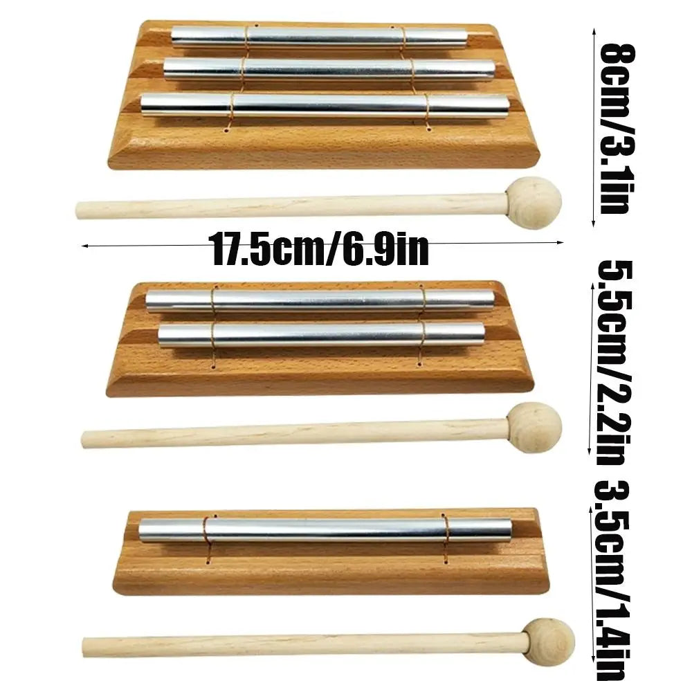 Meditation chime dimensions showing multiple size options with wooden base, metal bars, and mallet