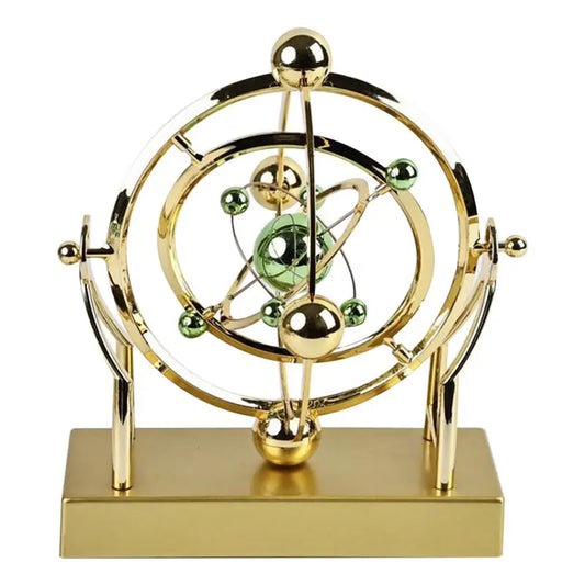 gold celestial orbit perpetual motion sculpture cosmic kinetic desk decor